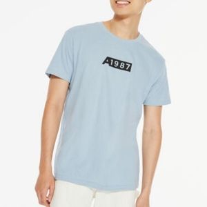 Men's light blue Aero 1987 tee